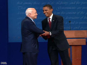 The presidential candidates shake hands at the start of their first debate.